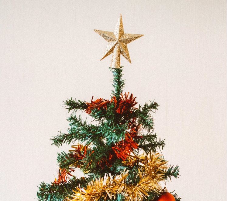 The Therapeutic Benefits of Decorating a Skinny Christmas Tree with Green Ornaments